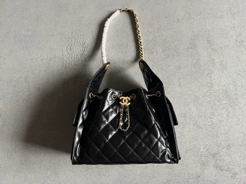 Black quilted shoulder bag with chain strap for women